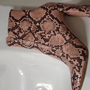 Light pink and black ankle boots